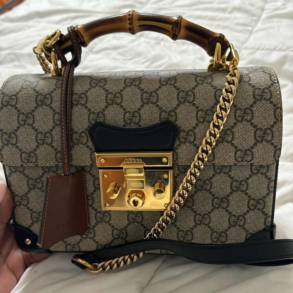 Gucci purse with bamboo handle and gold chain